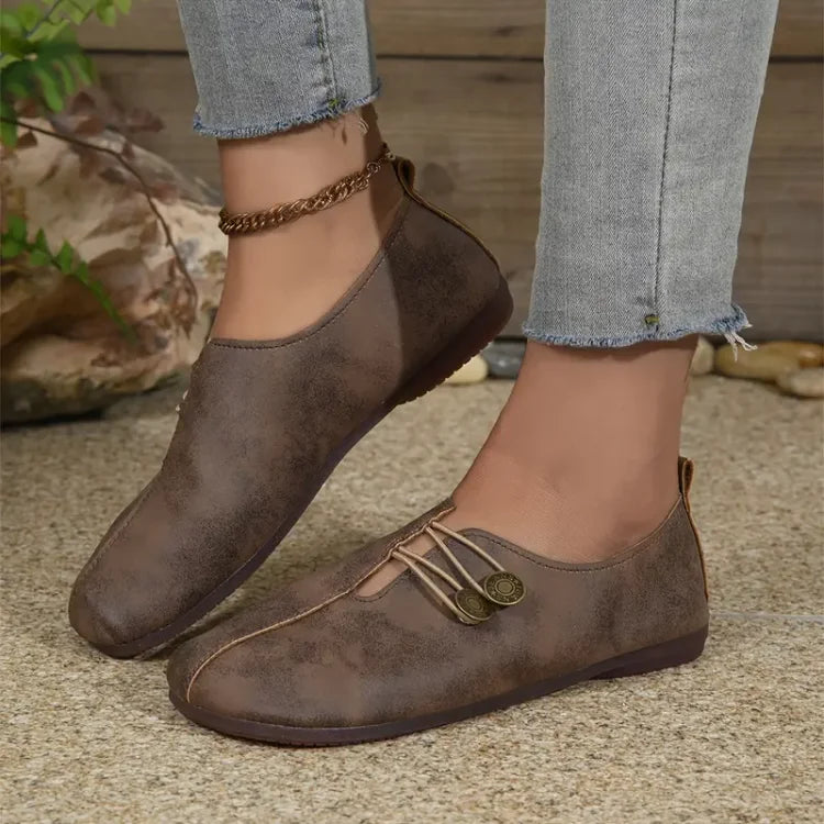 Elegante flache Schuhe mit runder Spitze und weicher Sohle für Damen mit Schnallenverzierung